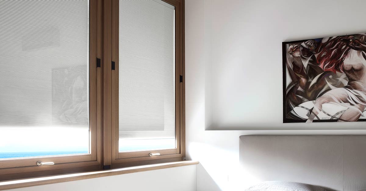 Arredare e proteggere casa con le tende interne al vetro, ottimizzando gli spazi